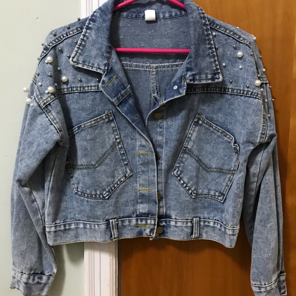 Denim jacket with pearl accent. NEW